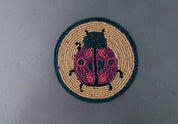 Sous-verres perlés