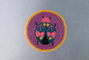 Sous-verres perlés